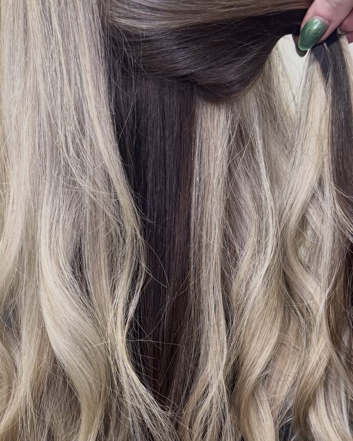 Early 2000s inspired chunky contrast — platinum underneath a darker top layer, fashion color by Auburn CA hairstylist Kayla MacArthur.